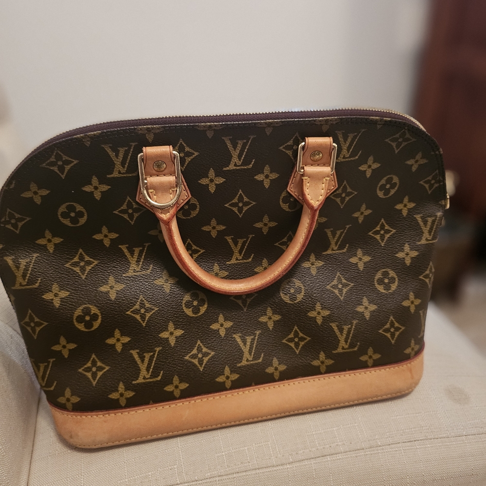 Louis Vuitton Alma Monogram Brown Handbag